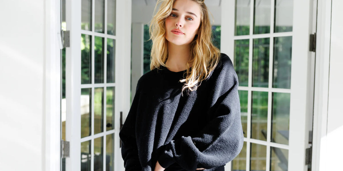 perfectwhitetee, essentials you'll want in your closet. women wearing our oversized ziggy sweatshirt.