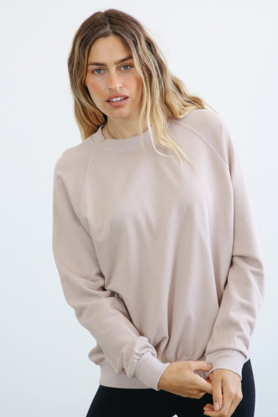 The perfect slightly oversized sweatshirt.  Longer length so it's easy with leggings, or perfectly paired with our Nash joggers. Made with 100% cotton french terry. This sweatshirt has a classic fit and vintage feel. Pictured in Mauve Mist.
