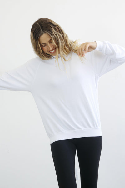 The perfect slightly oversized sweatshirt.  Longer length so it's easy with leggings, or perfectly paired with our Nash joggers. Made with 100% cotton french terry. This sweatshirt has a classic fit and vintage feel. Pictured in White.