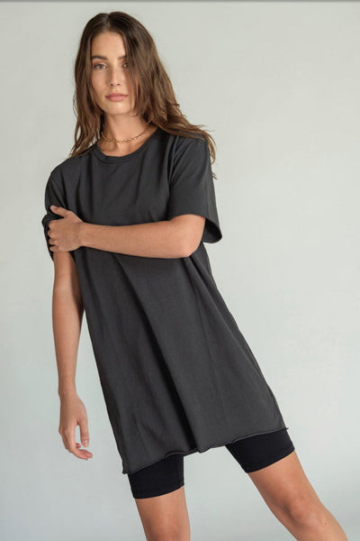 This super soft mini dress feels like a vintage concert tee. The perfect tee-shirt made into a dress with a raw hem and sleeve. Easy to wear, day to night, night to day. 100% crisp cotton. Many perfectly curated hues to choose from. Pictured in vintage black.