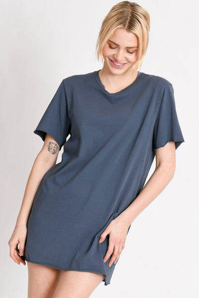 This super soft mini dress feels like a vintage concert tee. The perfect tee-shirt made into a dress with a raw hem and sleeve. Easy to wear, day to night, night to day. 100% crisp cotton. Many perfectly curated hues to choose from. Pictured in Night (slate blue grey.)