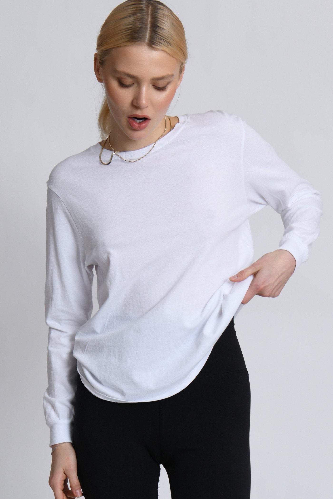 This is the perfect long sleeve cotton tee. Available in several colors (pictured in White). Buy now!  Edit alt text